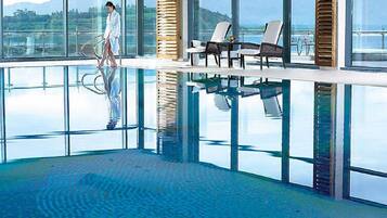 Relax and socialize by the pool with a clear view of the surrounding landscape.