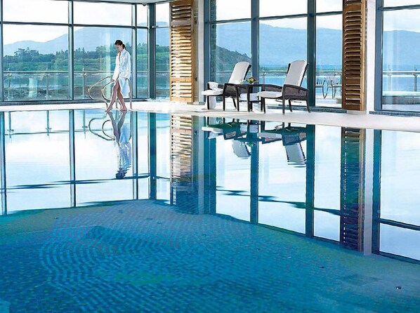 Relax and socialize by the pool with a clear view of the surrounding landscape.