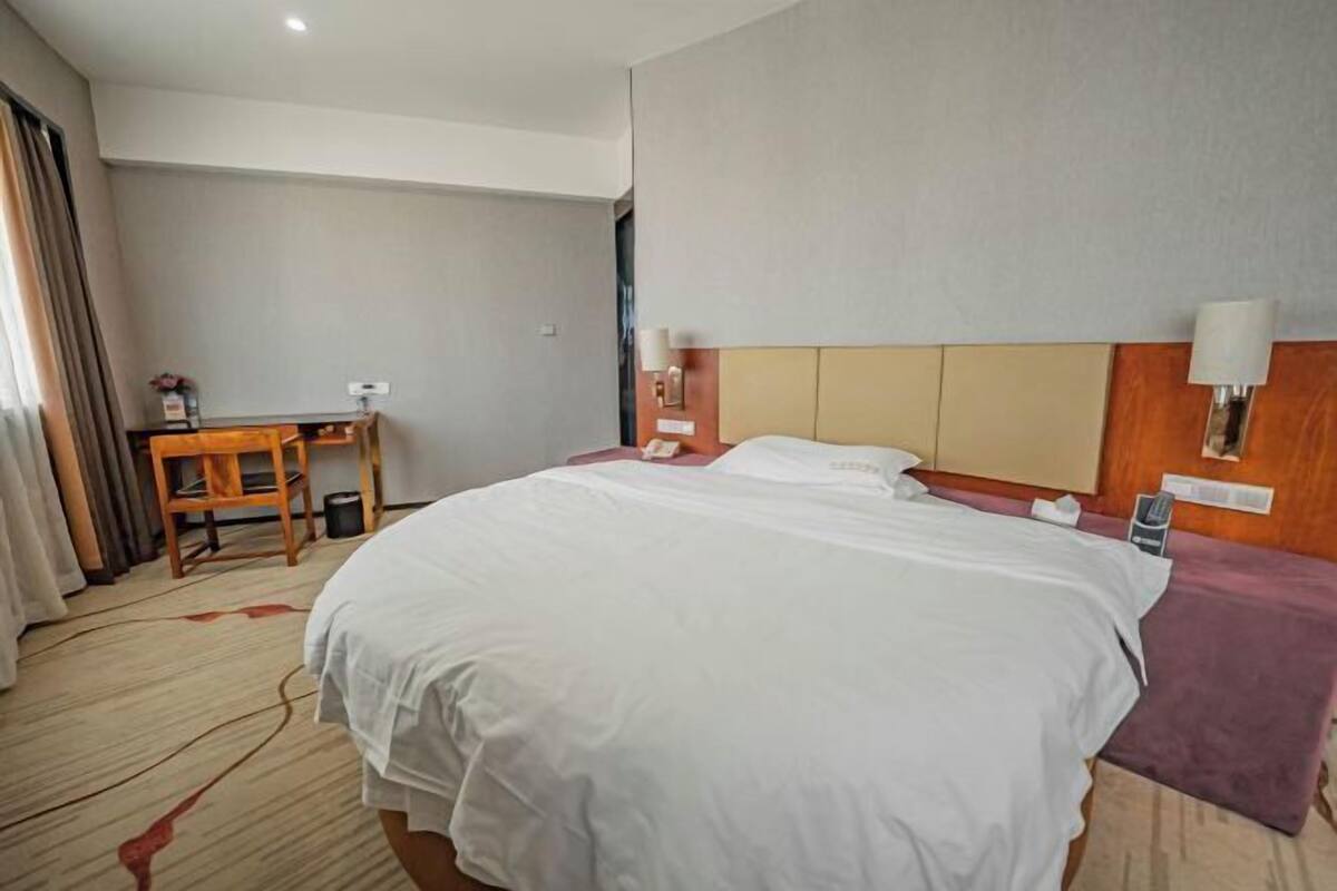 Cortinas blackout, wifi gratis y ropa de cama