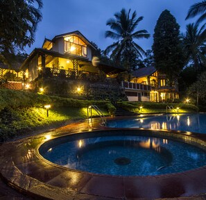 Outdoor pool, pool umbrellas, pool loungers - Tranquil Resort - BluSalzz Collection, Wayanad (Sulthan Bathery)