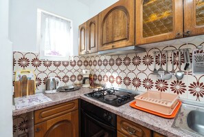 Apartment (A1) | Private kitchen | Fridge, oven, stovetop, espresso maker - Apartment Luketa (Primosten)