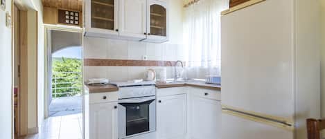 Cuisine privée | Réfrigérateur, surface de cuisson, bouilloire électrique, grille-pain