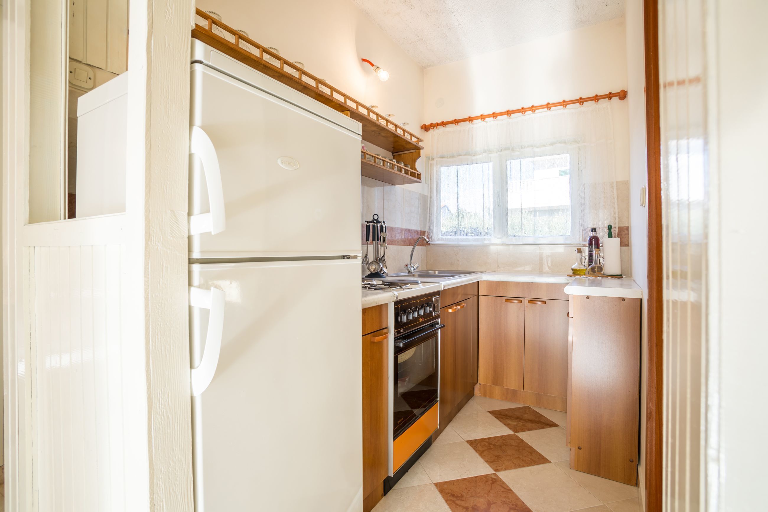 مطبخ خاص | ثلاجة، موقد طهي مسطح، غلّاية كهربائية، محمصة خبز