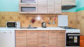 Apartment (A2) | Private kitchen | Fridge, microwave, oven, stovetop