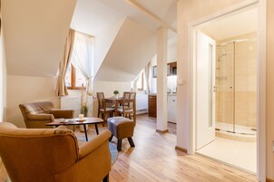 Apartment, 1 Bedroom, Kitchenette, City View (3) | Living area | Flat-screen TV