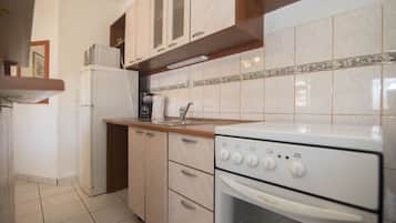 Apartemen (A1) | Dapur pribadi | Lemari es dan ketel listrik