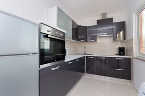 Lägenhet (A2) | Eget kök | Kylskåp, mikrovågsugn, spishäll och diskmaskin