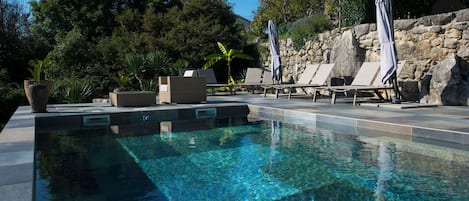 Outdoor pool, pool umbrellas, pool loungers
