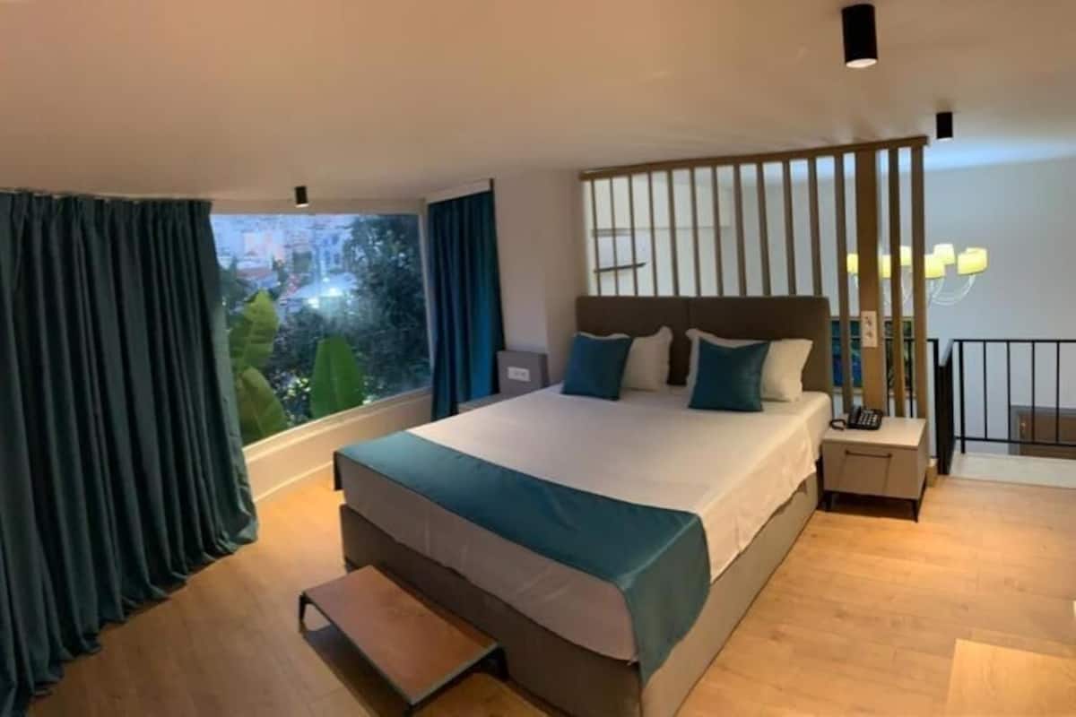 Duplex Suite with Balcony - Ground Floor (no close bedrooms with a door)
