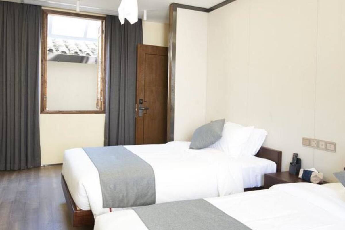 Chambre Deluxe avec lits jumeaux, non-fumeurs | Rideaux occultants, Wi-Fi gratuit