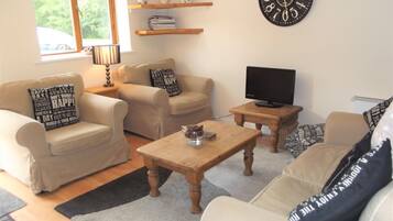 Cottage, 2 Bedrooms (Stable Cottage) | Living room | Flat-screen TV