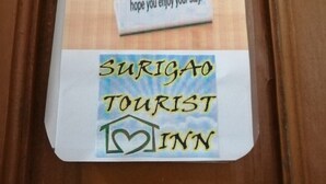 A sign indicating the room has been cleaned and sanitized, with a logo for Surigaon Tourist Inn. - Surigao Tourist Inn Main (Surigao)