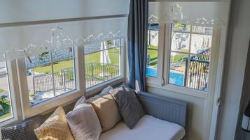 Premium bedding, blackout drapes, soundproofing, free WiFi