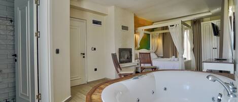 Deluxe Room, Fireplace | Premium bedding, blackout drapes, soundproofing, free WiFi