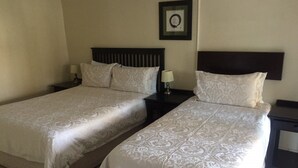Basic Double Room | Minibar, desk, blackout curtains, iron/ironing board - Toro Guest House (Moses Kotane)