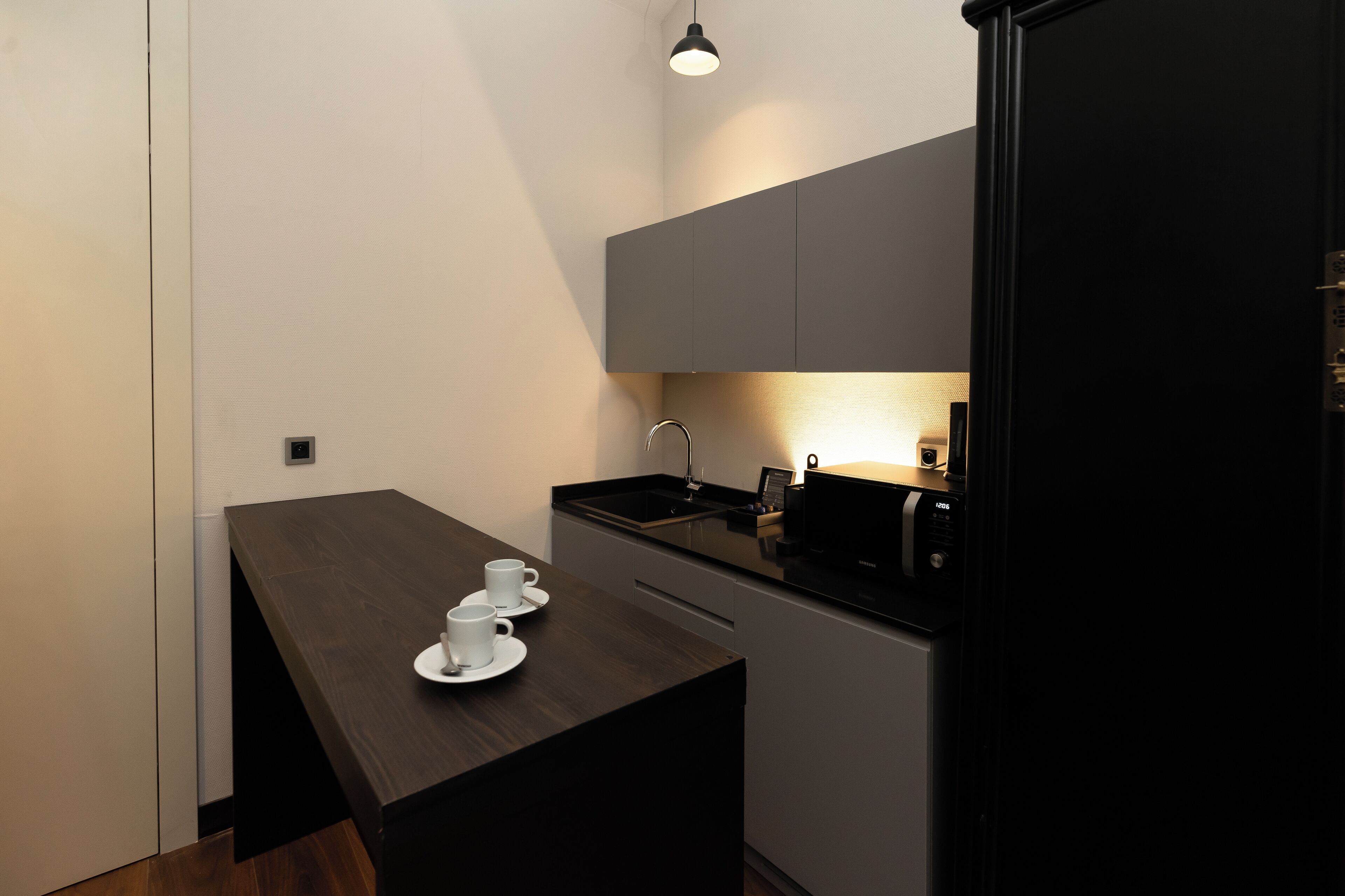 superior double room, kitchen (basement) | in-room safe, desk, free wifi, bed sheets