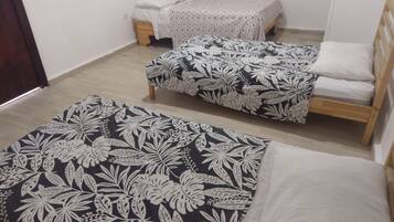 Family Villa, Beach View | Laptop workspace, iron/ironing board, free WiFi, bed sheets