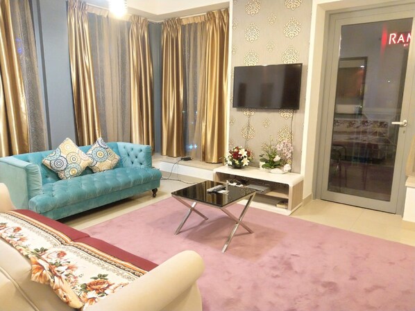 Apartment, 1 Bedroom (Burj Khalifa and fountain view) | Living area