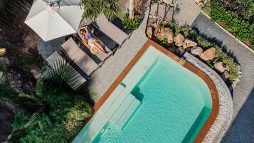 Outdoor pool, open 7:00 AM to 8:00 PM, pool umbrellas, pool loungers