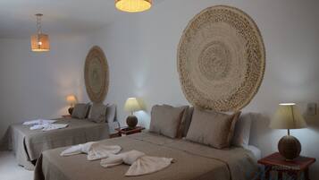 Standard Quadruple Room | Blackout curtains, free WiFi