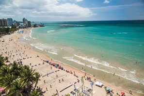 On the beach, sun-loungers, beach towels
