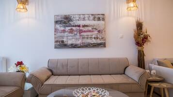 City Apartment, 3 Bedrooms | Living area | Flat-screen TV