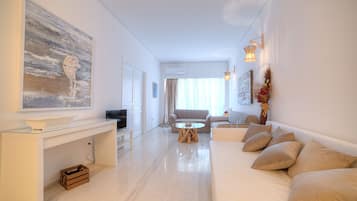City Apartment, 3 Bedrooms | Living area | Flat-screen TV