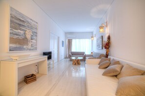 Lägenhet City - 3 sovrum | Vardagsrum | Platt-tv