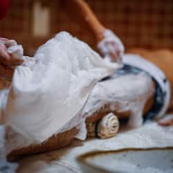 Experience a rejuvenating massage in a serene indoor setting.