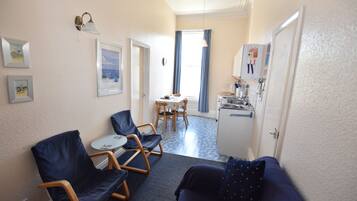 Triple Room, 1 Bedroom, Private Bathroom | Iron/ironing board, bed sheets