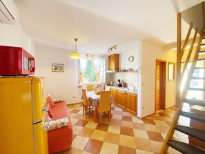 Fridge, microwave, stovetop, coffee/tea maker