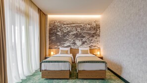 Habitació doble o amb dos llits individuals superior, vistes a la ciutat | 1 dormitori, roba de llit d'alta qualitat i minibar