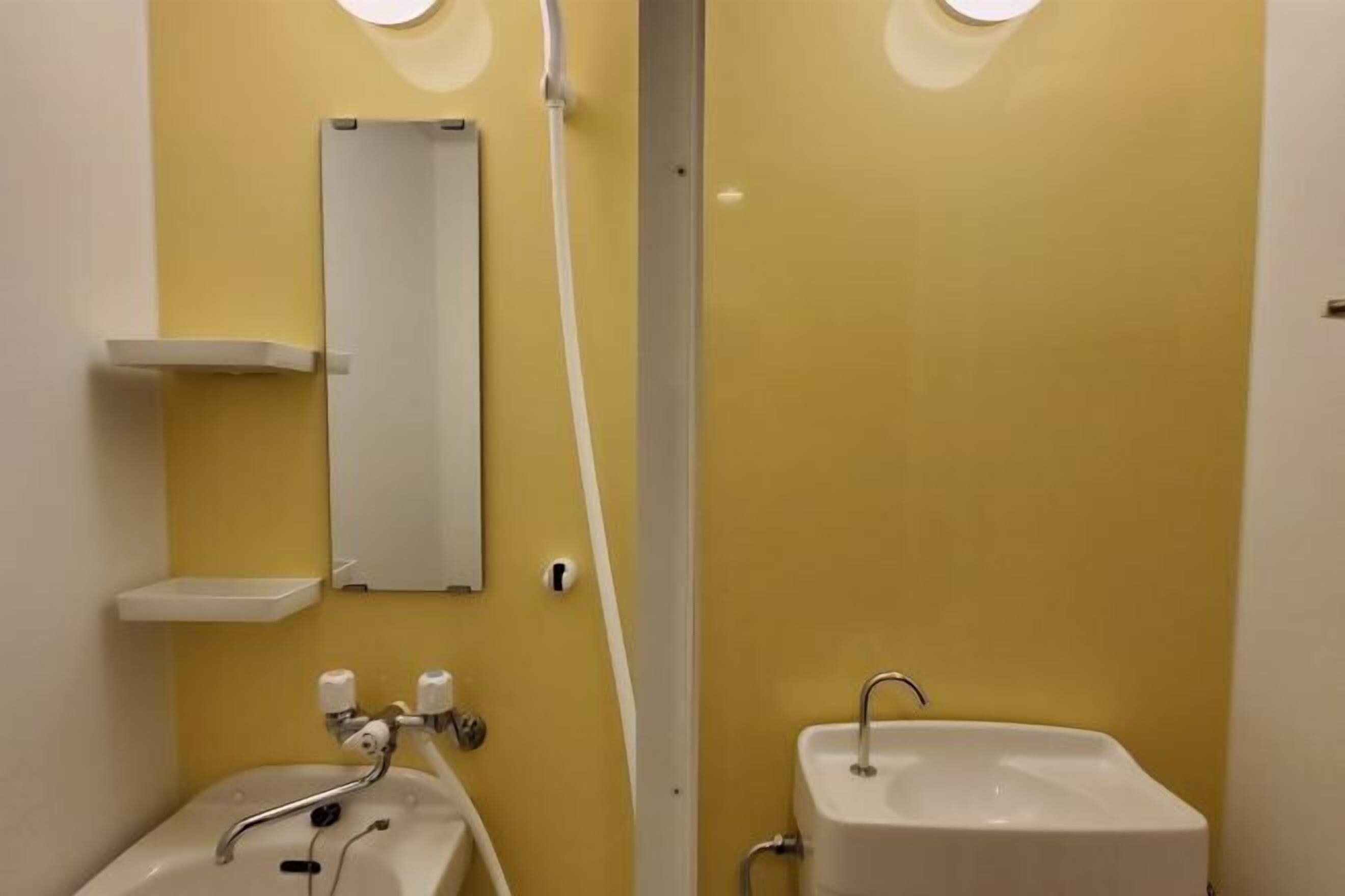 Shower, free toiletries, hair dryer, slippers