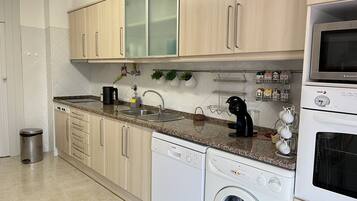 Family Apartment, 2 Bedrooms | Private kitchen | Full-size fridge, microwave, oven, stovetop