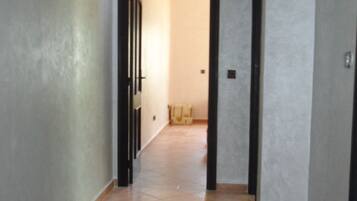 Apartemen | Area keluarga | TV layar datar