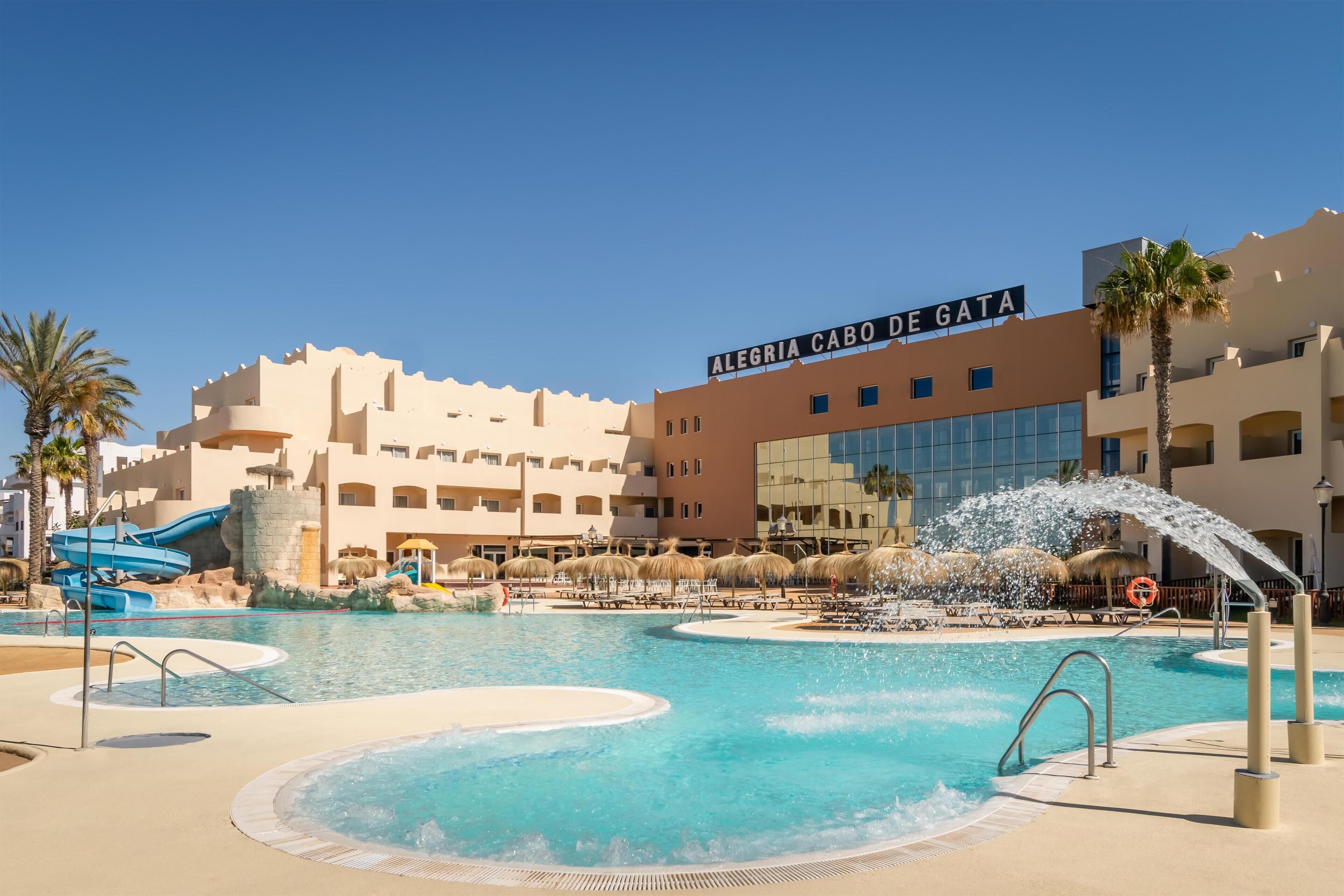 2 outdoor pools, pool umbrellas, pool loungers