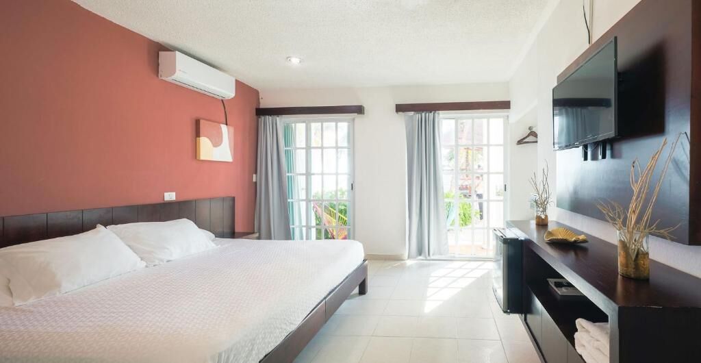 1 chambre, fer et planche à repasser, accès au Wi-Fi (inclus)