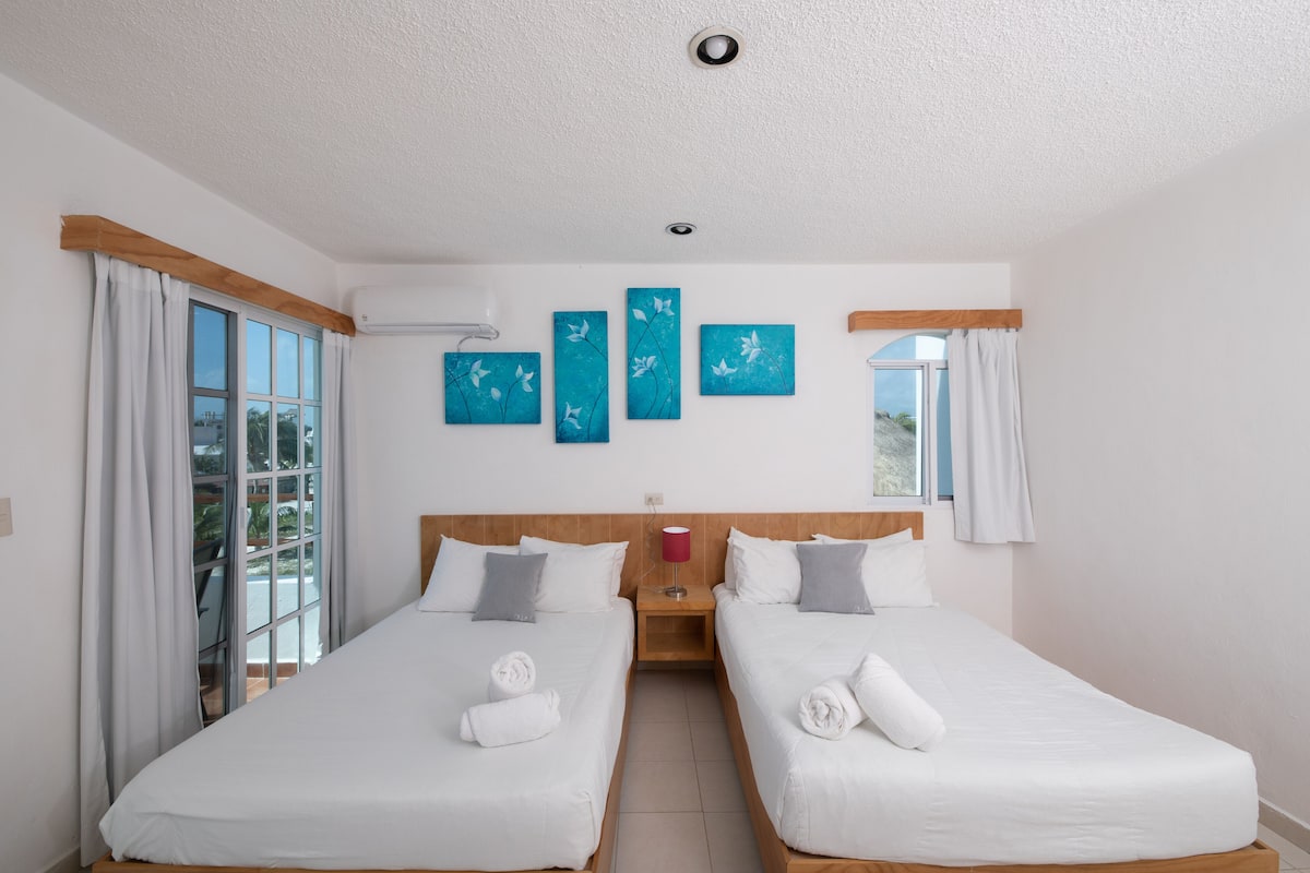 Chambre Deluxe, 2 lits doubles, vue partielle sur l'océan