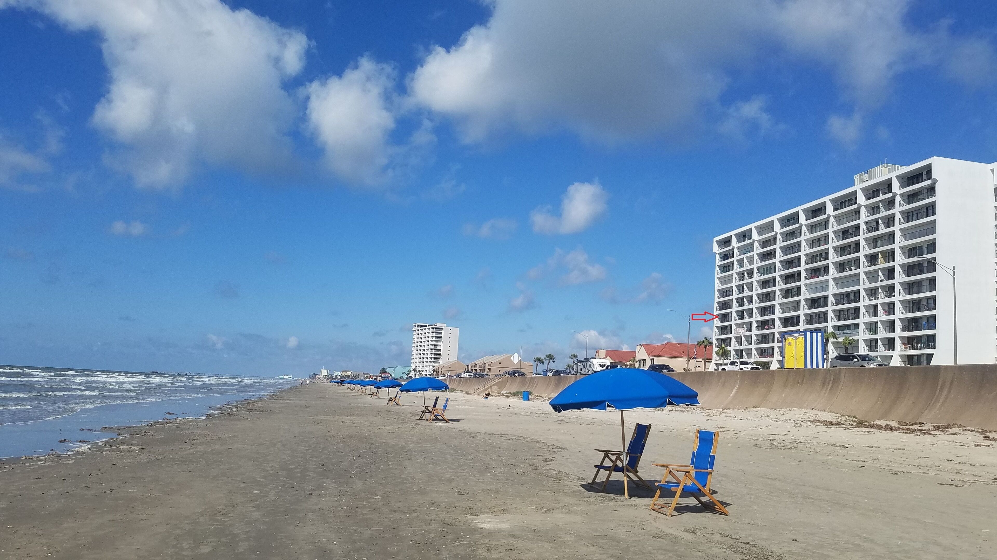 On the beach, sun loungers, beach umbrellas