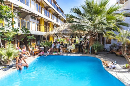 Outdoor pool, open 8:00 AM to 10:00 PM, sun loungers