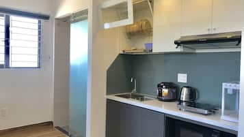 Basic Apartment | Private kitchen | Full-size fridge, microwave, stovetop, rice cooker