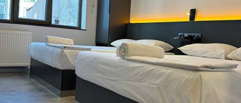 Roupas de cama premium, frigobar, escrivaninha, Wi-Fi de cortesia