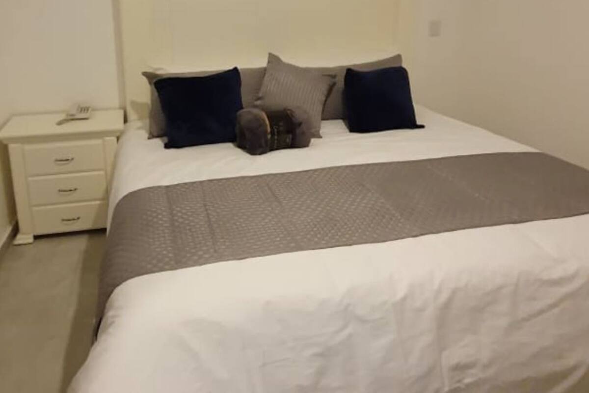 Blackout drapes, soundproofing, iron/ironing board (on request)