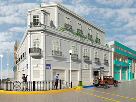 Un edificio de estilo arquitectónico clásico, con varias ventanas y balcones.
