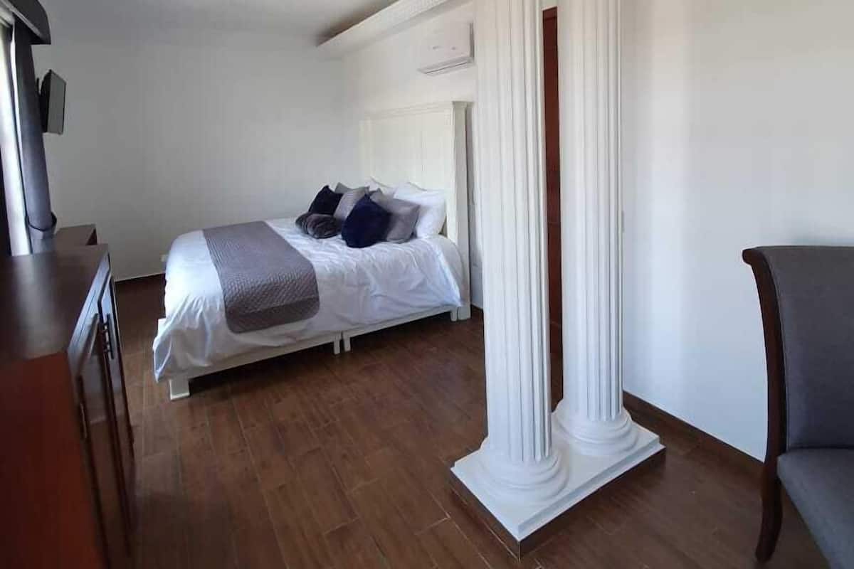 Blackout drapes, soundproofing, iron/ironing board (on request)