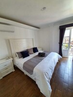 Blackout drapes, soundproofing, iron/ironing board