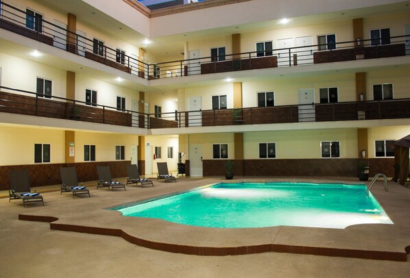 Outdoor pool, pool umbrellas, pool loungers