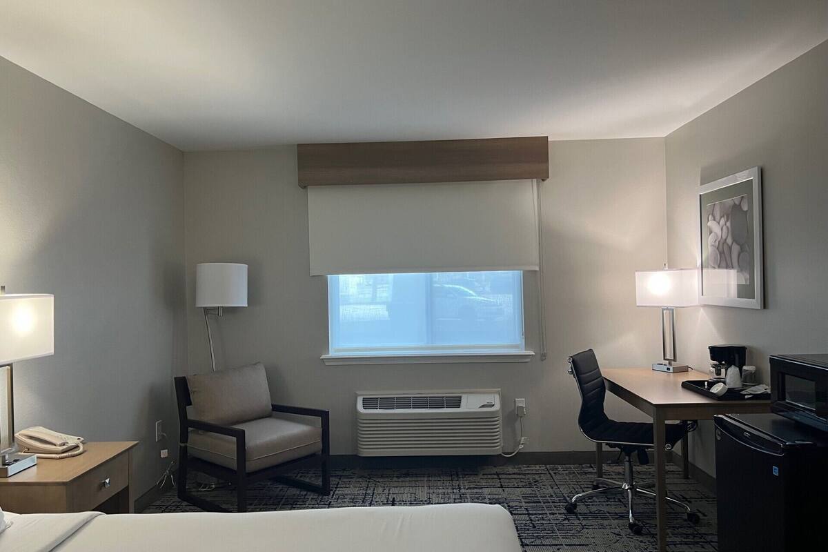 basic single room | desk, laptop workspace, blackout curtains, iron/ironing board