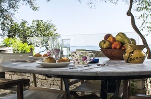 Outdoor dining - Amazing view, dominates Ipsos bay and several other bays to the city of Corfu. (KERKYRA)