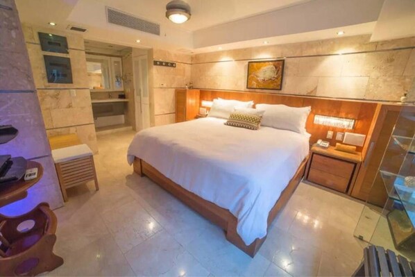 Apartment, 1 Queen Bed with Sofa bed (1 Bathroom - C1-B) | 1 bedroom, iron/ironing board, free WiFi, bed sheets